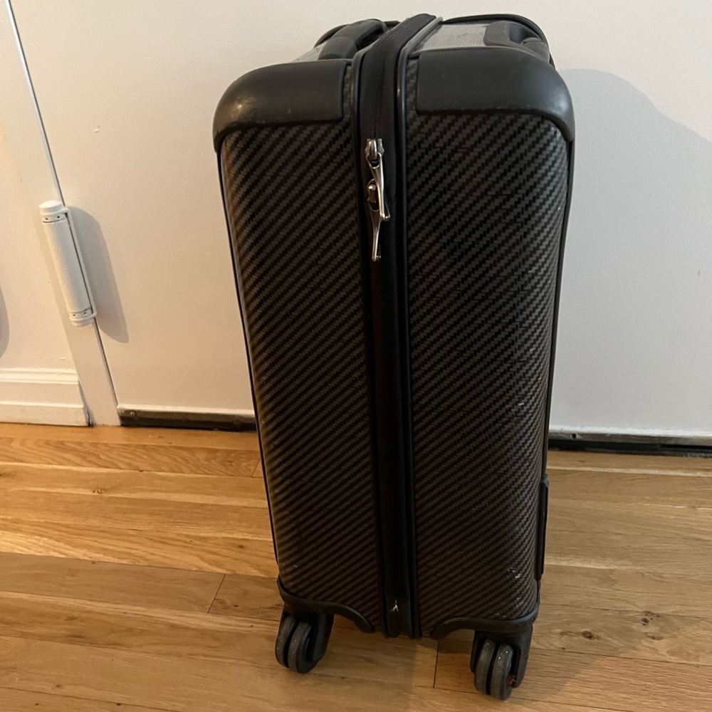 TUMI carry-on suitcase
